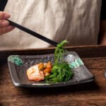 Factory direct selling Japanese tableware characteristic hotel restaurant creative sushi dim sum square plate matte black multi-angle plate