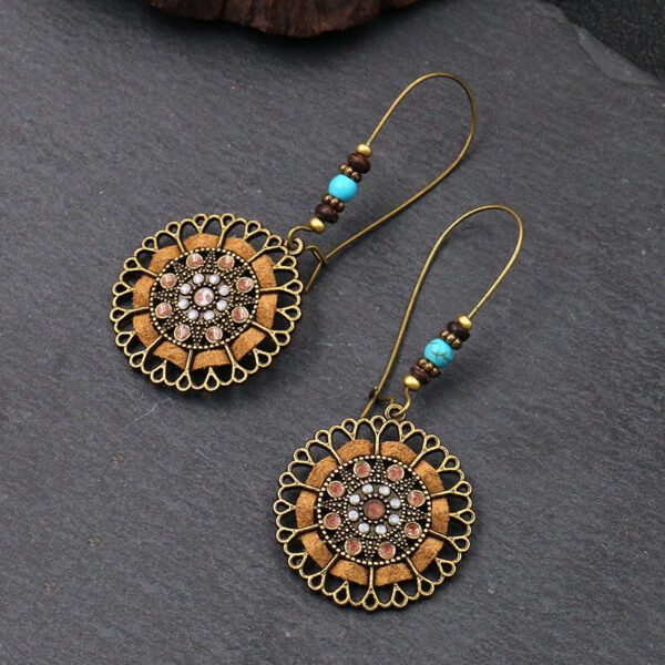 Cross-border niche ethnic style earrings female hollow alloy earrings European and American original jewelry wholesale factory direct sales