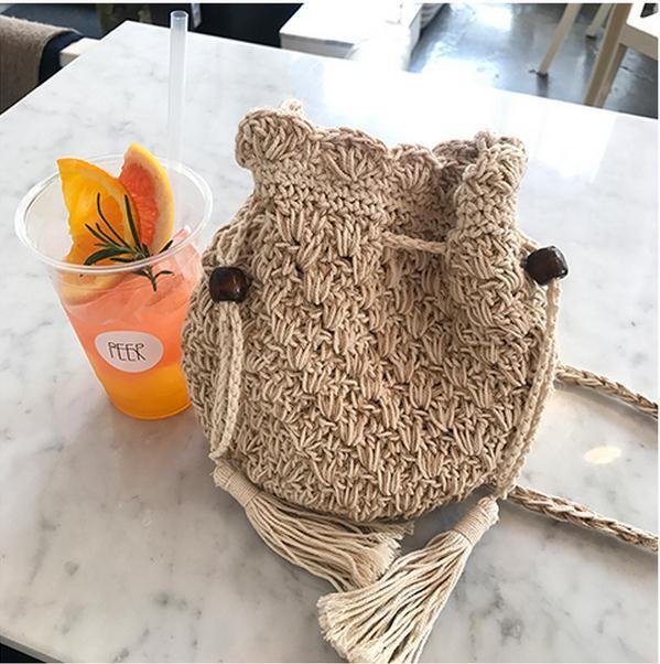 Japanese Xinsen women's retro small bag cotton and linen woven women's bag one-shoulder oblique span bucket bag tassel drawstring beach bag