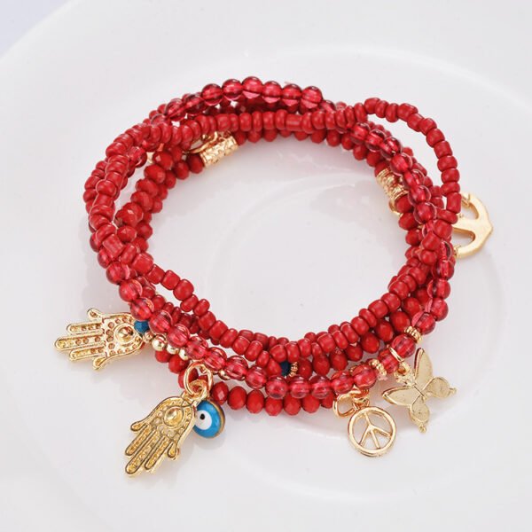 Factory direct sale one batch of multi-layer rice beads beaded fashion Buddha heart bracelet eye butterfly pendant bracelet