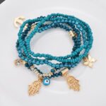Factory direct sale one batch of multi-layer rice beads beaded fashion Buddha heart bracelet eye butterfly pendant bracelet - Image 2