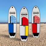 Inflatable paddle board including basic surfboard accessories