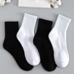 Zhuji socks solid color socks men's medium tube spring sweat-absorbing breathable sports socks simple stockings versatile new wholesale