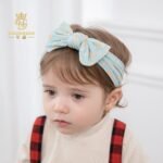 Niansheng jewelry new children's hair accessories European and American wide-brimmed elastic nylon embossed bow baby print headband
