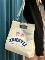 Japanese casual college style commuter Messenger bag female 2022 new student class portable single shoulder canvas bag - Image 3