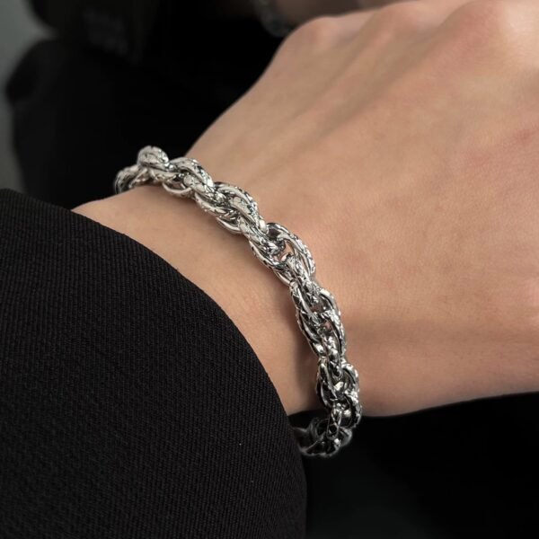 New European and American woven twist titanium steel bracelet men's ins trendy brand high-end hip-hop niche design couple bracelet