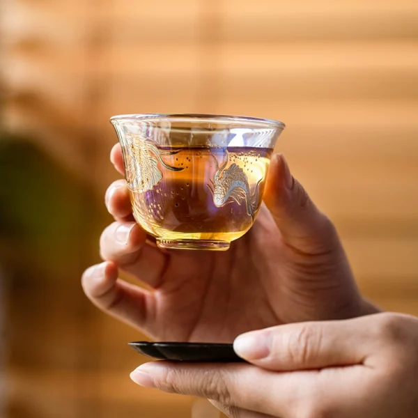 Glowing gold and silver fired heat-resistant glass tea cup