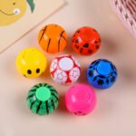 Cross-border nostalgic children's creative decompression finger gyro gashapon toy 35mm venting decompression football fingertip gyro - Image 4