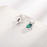 Asymmetric star earrings - Image 2