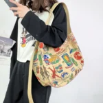 One-shoulder canvas bag women's large-capacity ins Korean style Japanese literature and art summer minority college students commuting Messenger bag - Image 2