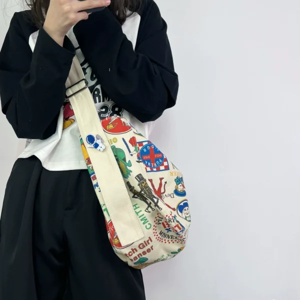 One-shoulder canvas bag women's large-capacity ins Korean style Japanese literature and art summer minority college students commuting Messenger bag