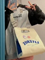 Japanese casual college style commuter Messenger bag female 2022 new student class portable single shoulder canvas bag - Image 4