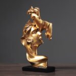 Gold character statue ornaments