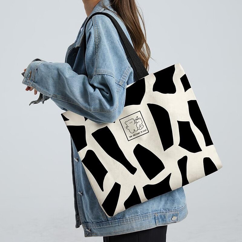 e9d2921ba483e454.jpg Shangmet canvas bag female shopping bag college student handbag simple large-capacity shoulder bag literary fashion canvas bag Japanese environmental protection bag storage bag black and white stripes - Image 1